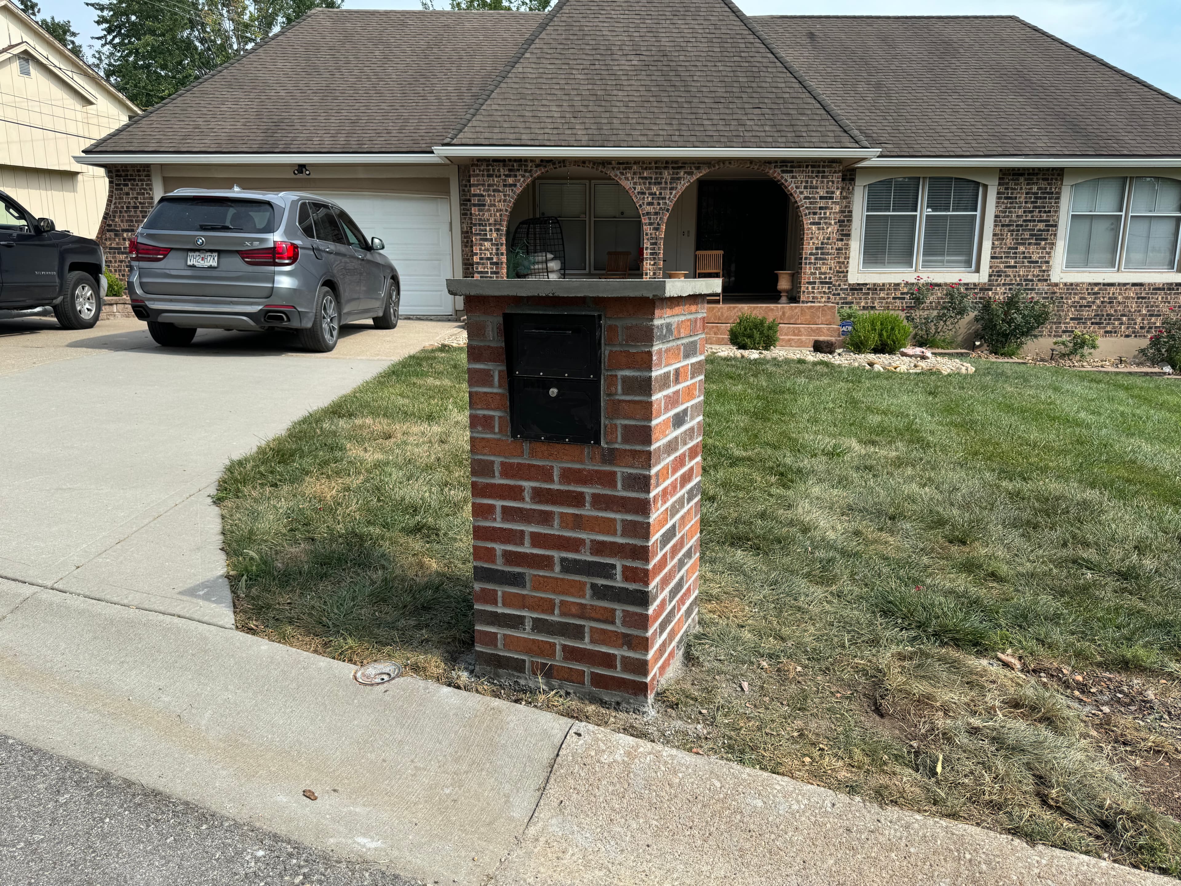 Brick mailbox matching home