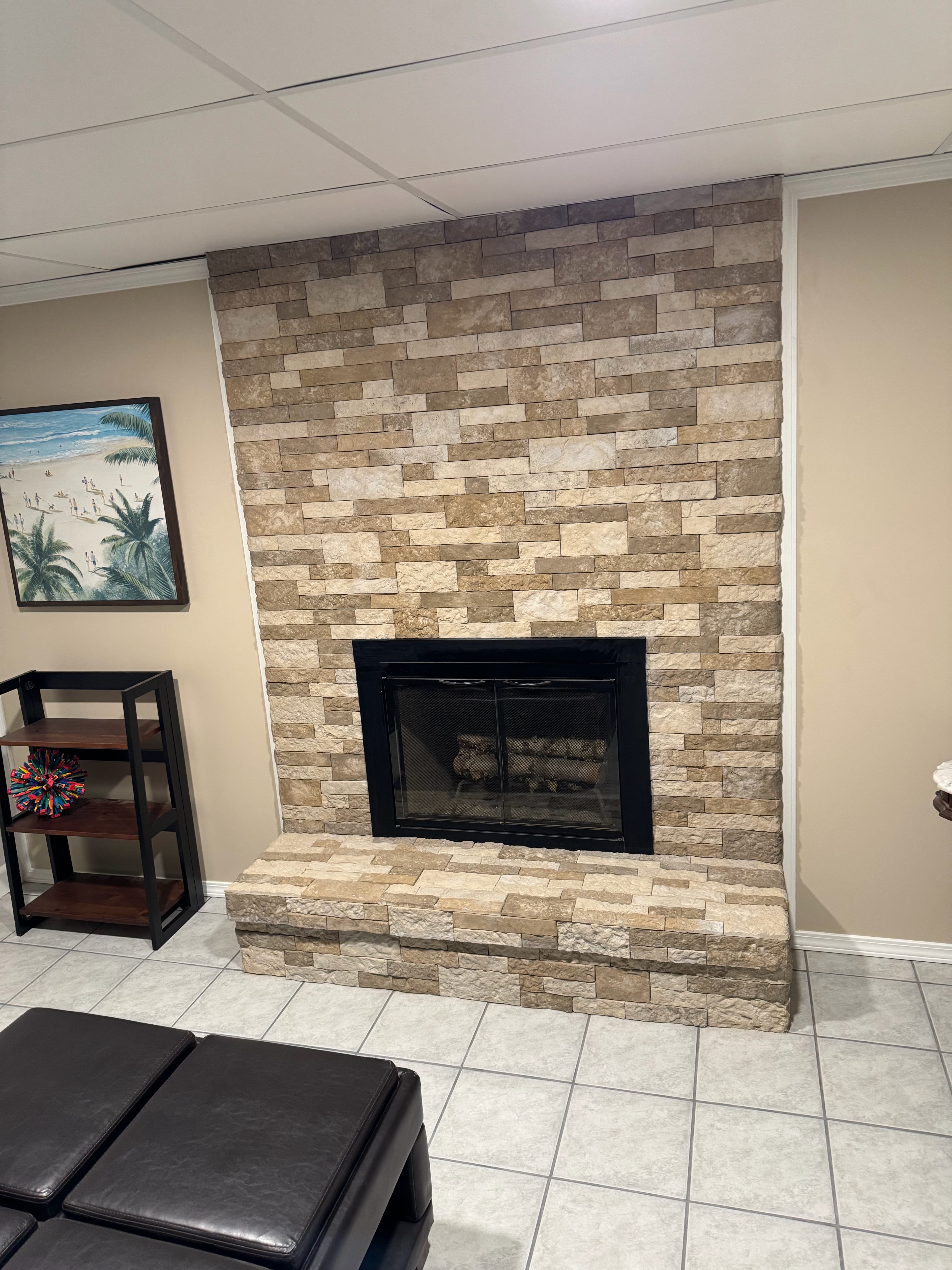 Interior stacked-stone fireplace