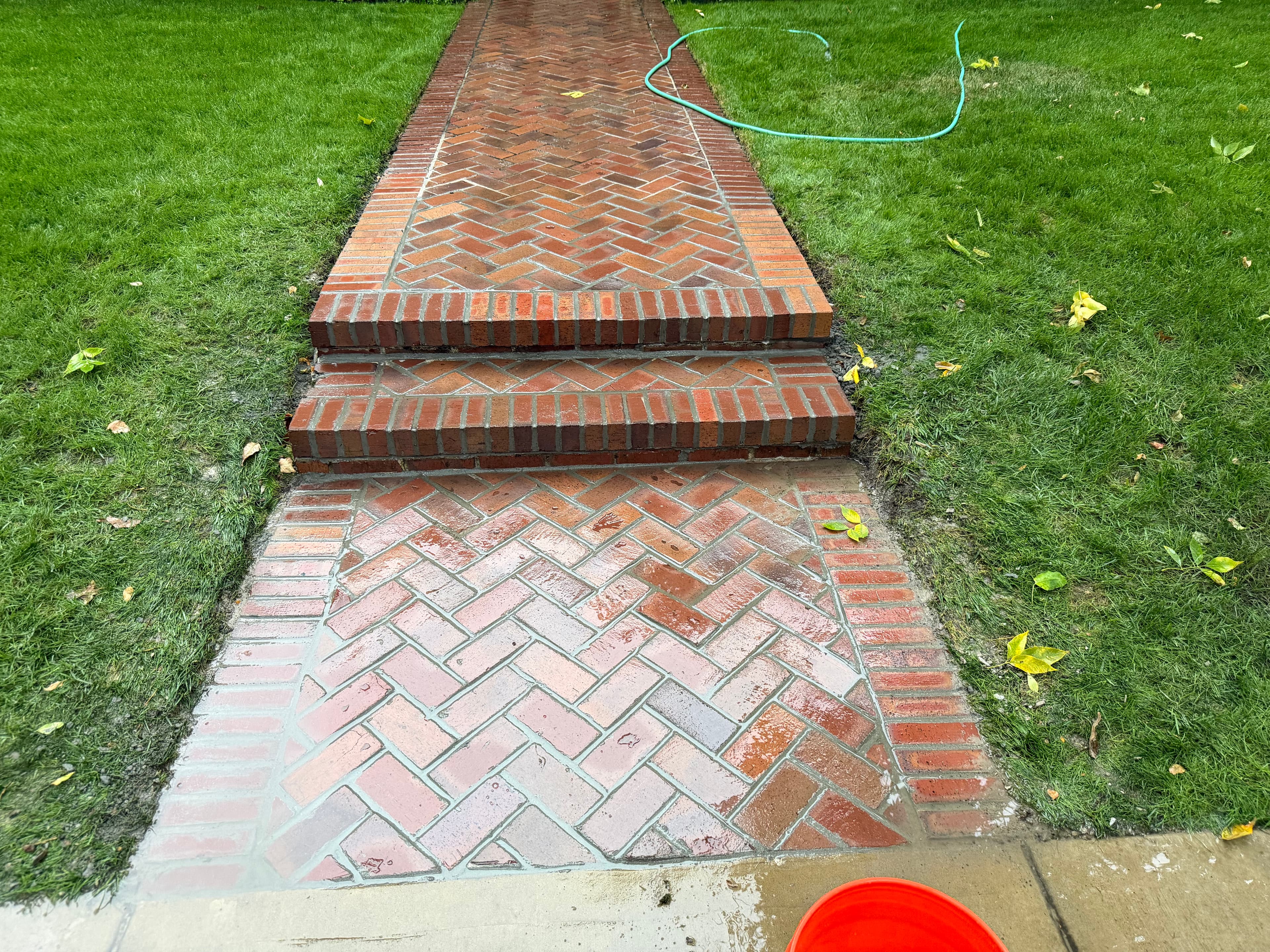 Brick herringbone walkway with steps