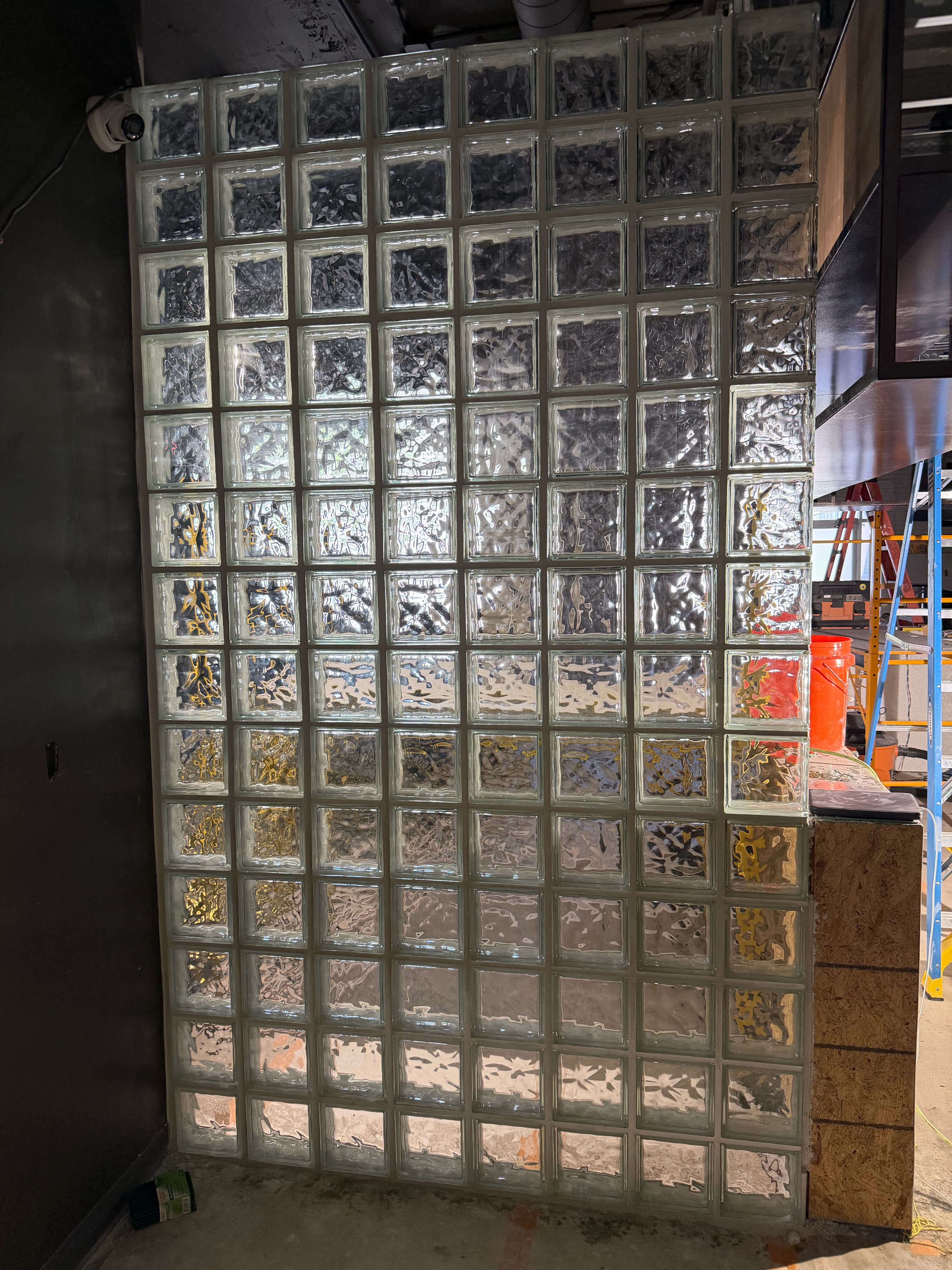 Tall glass block partition wall