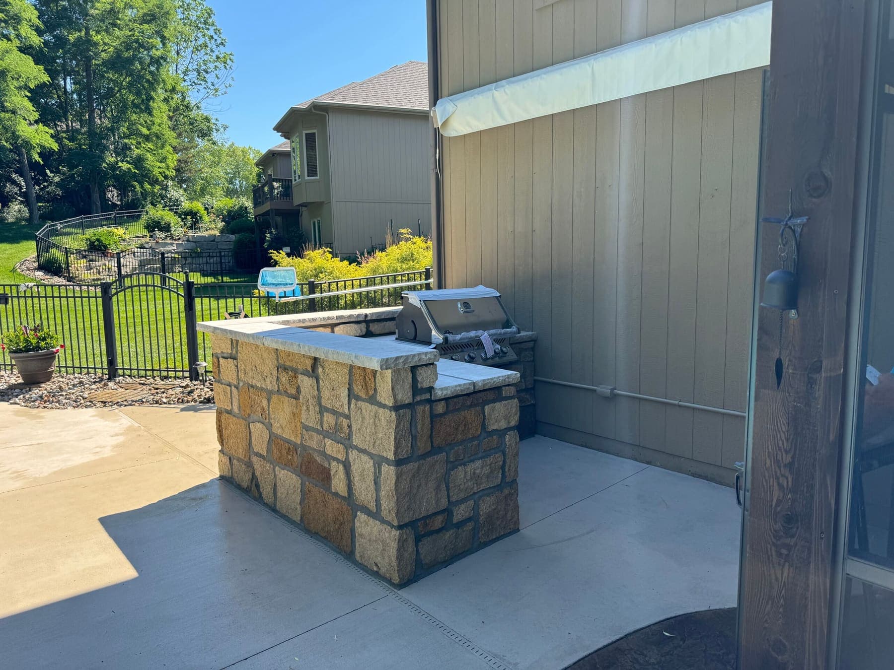Stone outdoor kitchen island