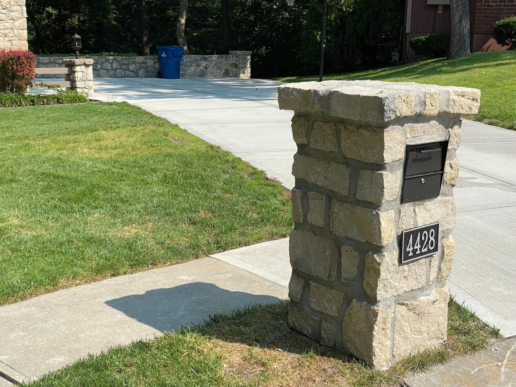 Stone mailbox pillar with recessed mailbox